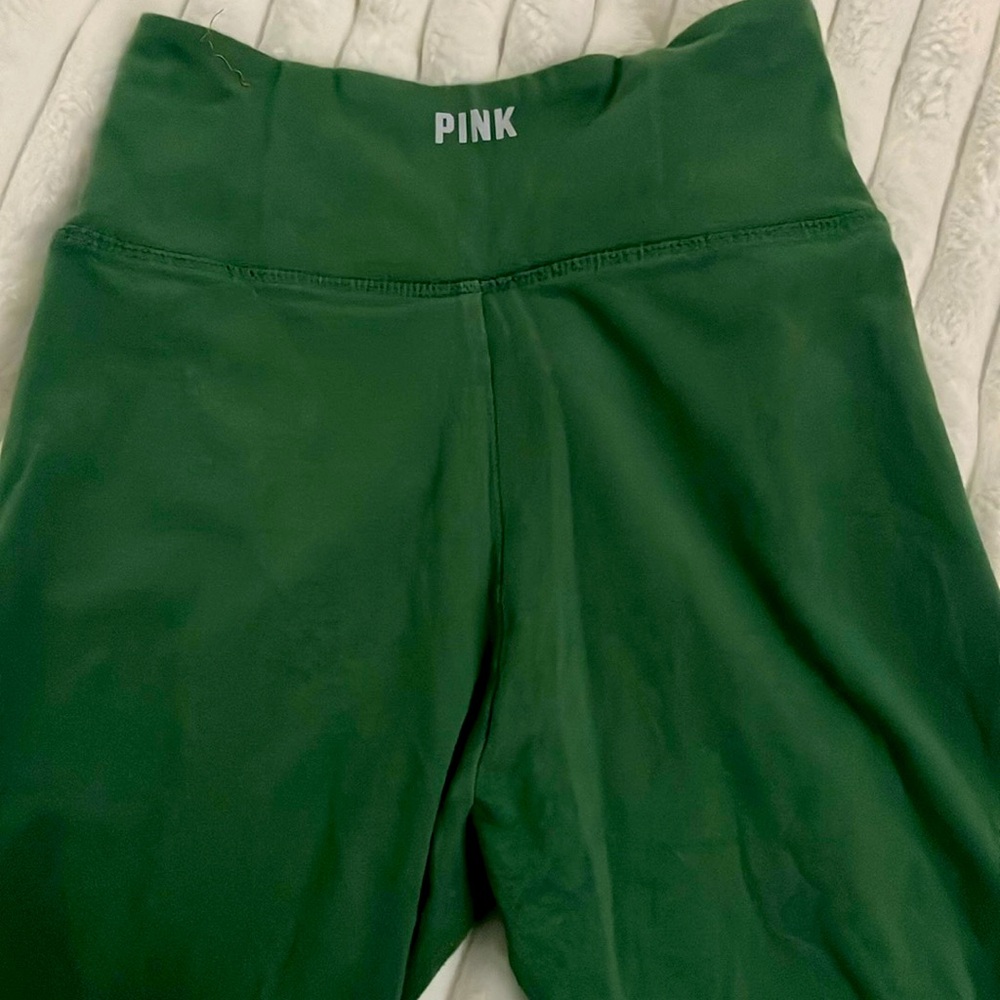 I’m selling an affordable pair of leggings (green) and size small